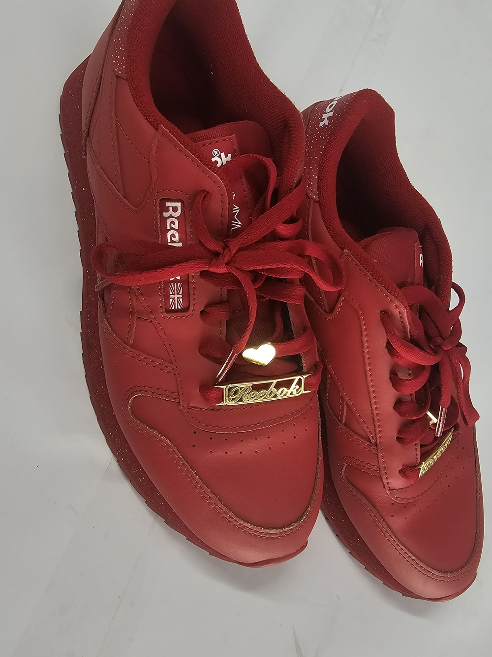Reebok Women's Red Low-Top Sneakers with Gold Accents
